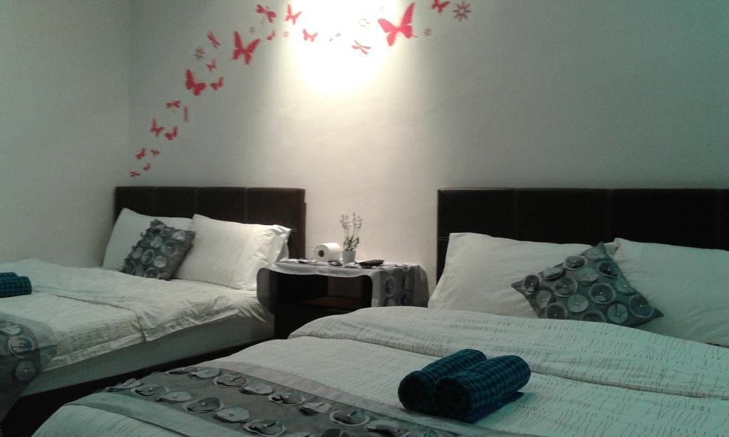 Best Seven Inn Kuah Room photo