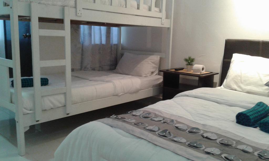 Best Seven Inn Kuah Room photo