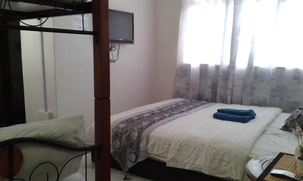Best Seven Inn Kuah Room photo
